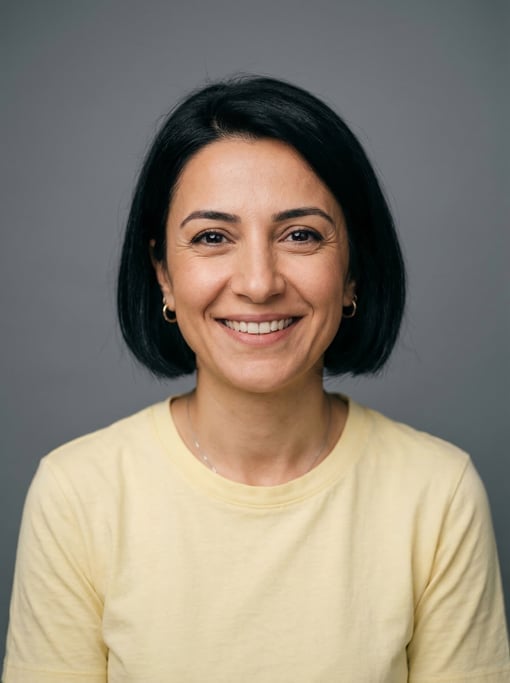 Professional studio headshot of a 39-year-old Turkish woman with a chin-length bob in jet black