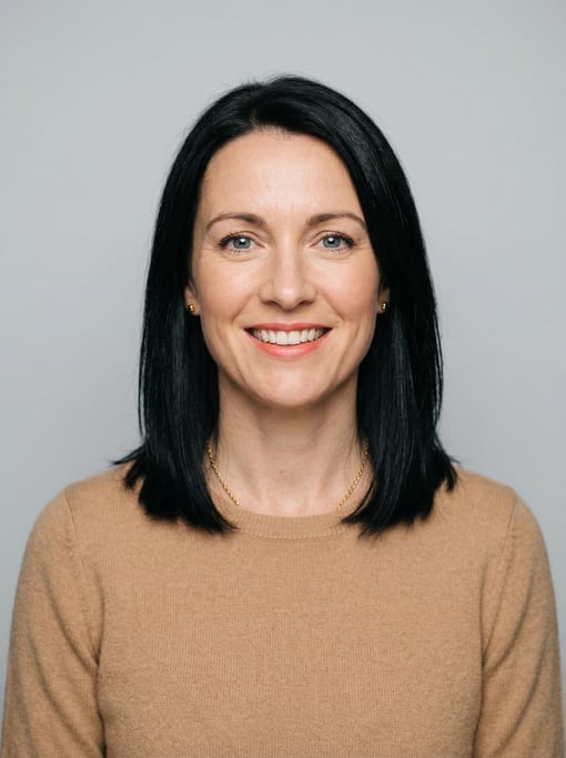 Professional studio headshot of a 40-year-old White British woman with shoulder-length straight blac