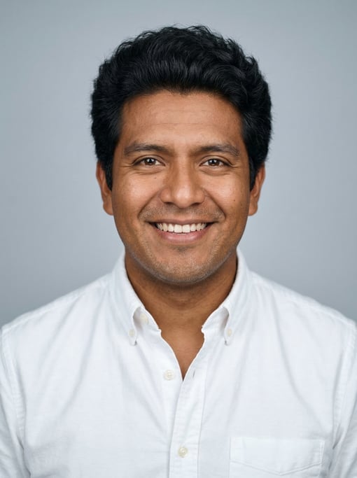 Professional studio headshot of a 31-year-old Mexican man with thick coarse black hair with natural