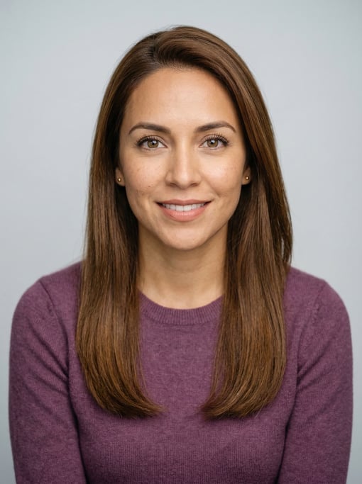 Professional studio headshot of a 29-year-old Latina woman with long straight chestnut hair