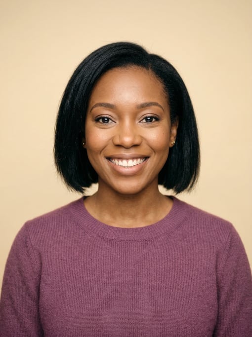 Professional studio headshot of a 29-year-old Black African woman with a chin-length bob in jet blac
