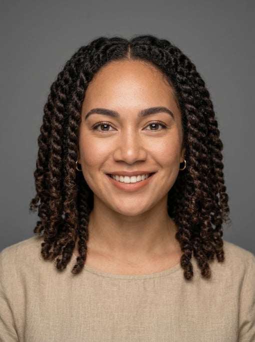 Professional studio headshot of a 24-year-old Polynesian woman with twist-outs in dark brown