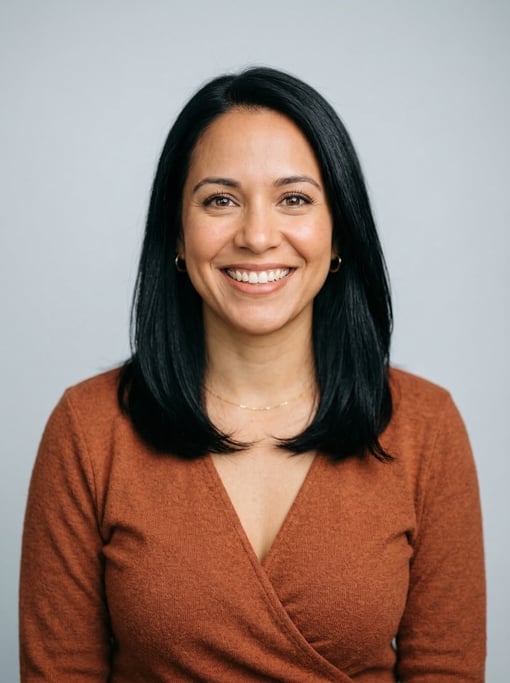 Professional studio headshot of a 35-year-old Puerto Rican woman with shoulder-length straight black