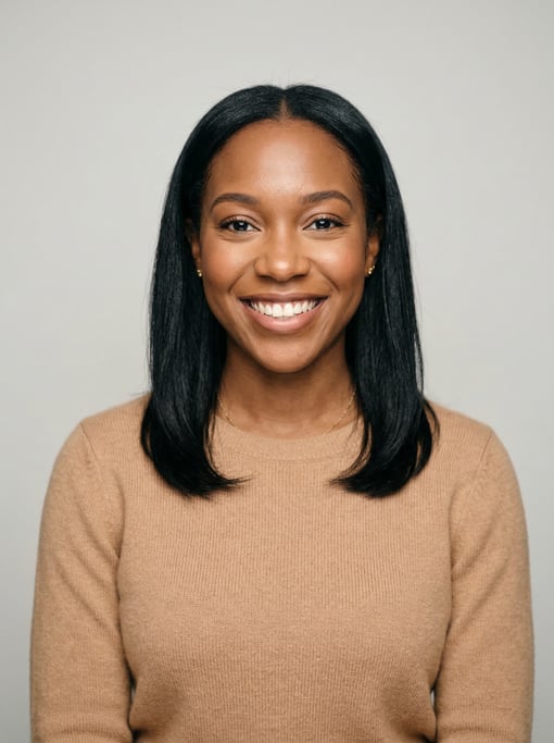 Professional studio headshot of a 28-year-old Black American woman with shoulder-length straight bla