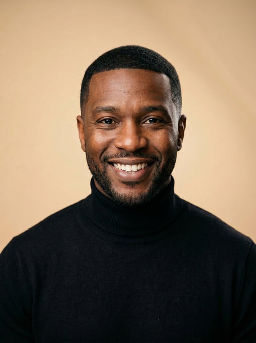 Professional studio headshot of a 40-year-old Black American man with a Caesar cut in black