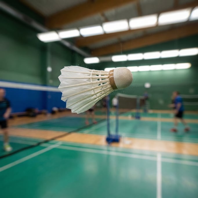Close-up of a badminton shuttlecock in mid-flight
