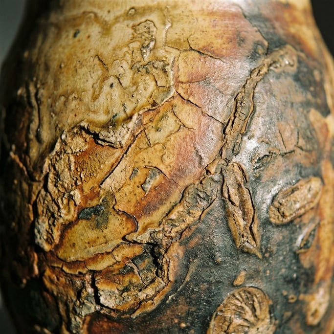 Detail photograph of Hand-thrown stoneware glaze in macro