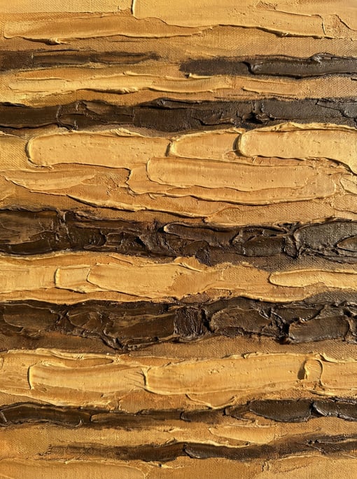 Yellow ochre and raw umber oil paint applied in alternating horizontal bands like geological strata