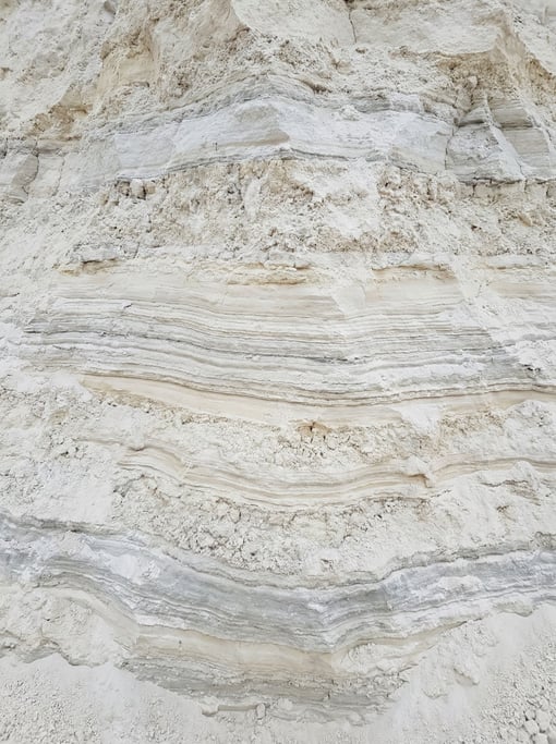 Kaolin white clay in smooth thick layers dominating the composition