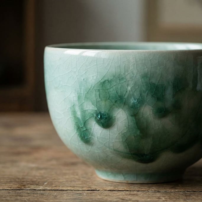 Celadon glaze surface with its characteristic jade-green translucent depth