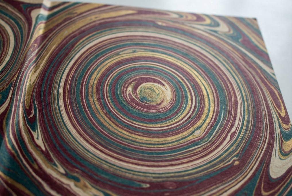 Marbled paper endsheet in Turkish stone pattern filling the frame