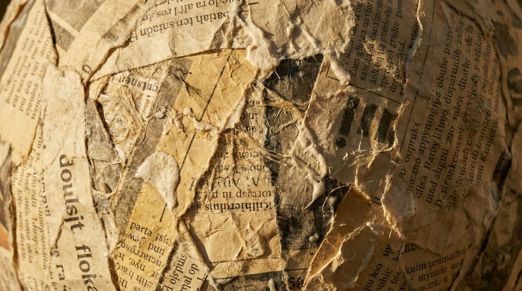 Papier-mache surface in extreme close-up filling the frame