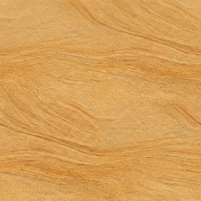 Seamless tileable texture of sandstone in honey gold