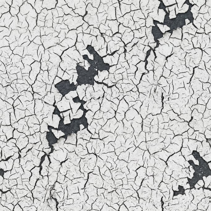 Seamless tileable texture of crackled paint in extreme close-up showing micro-detail