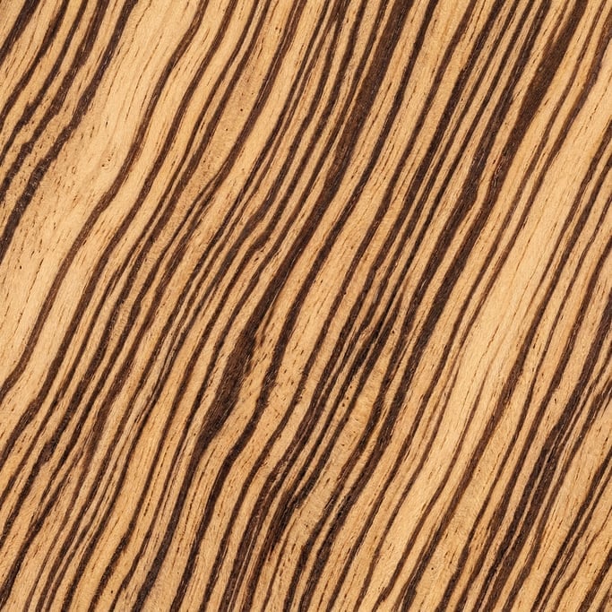 Seamless tileable texture of zebrawood in extreme close-up showing micro-detail