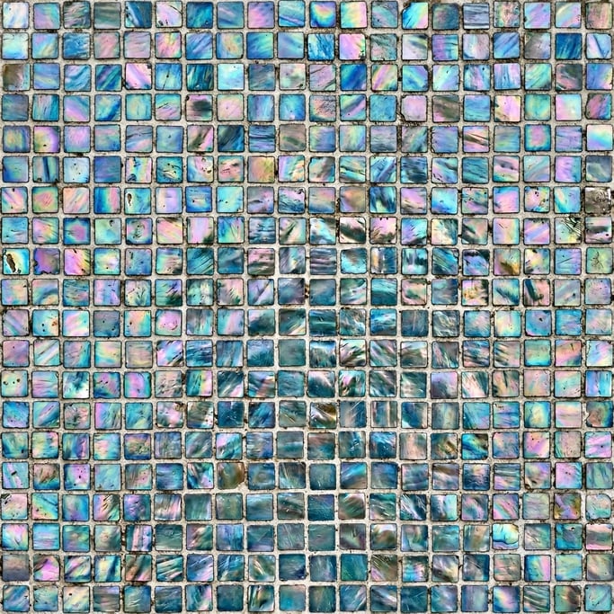 Seamless tileable texture of mosaic tile in iridescent lightly weathered and aged