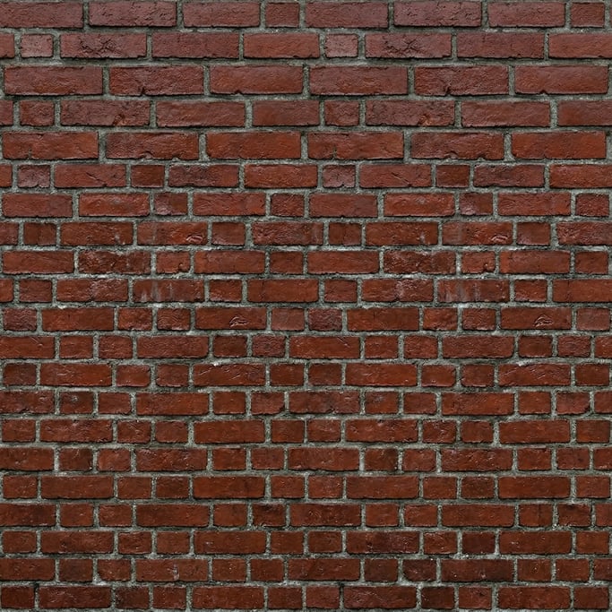 Seamless tileable texture of red brick wall wet with water