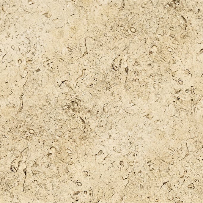 Seamless tileable texture of Jerusalem stone heavily worn and patinated