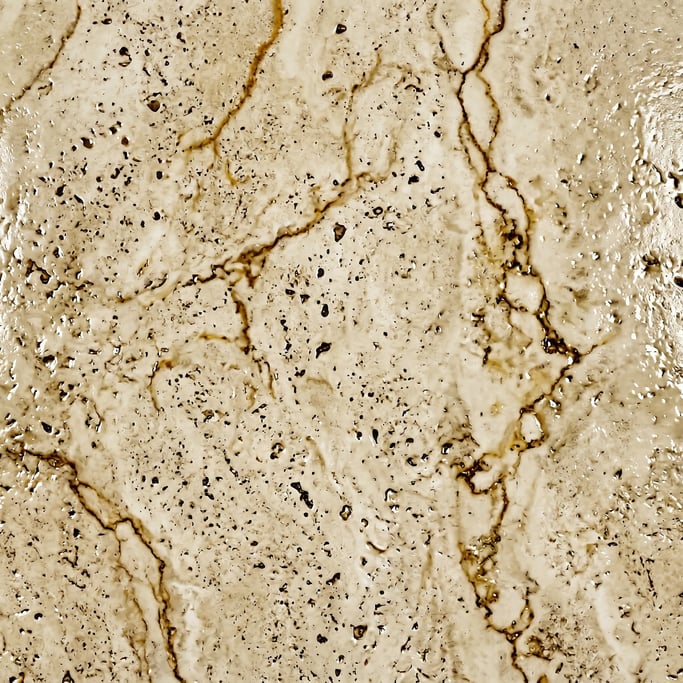 Seamless tileable texture of travertine in ivory wet with water