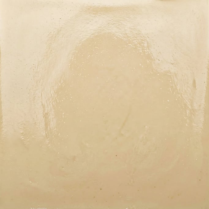 Seamless tileable texture of white chocolate wet with water