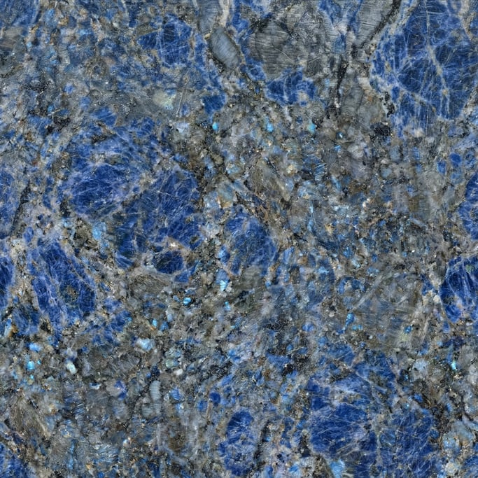 Seamless tileable texture of Blue Bahia granite heavily worn and patinated