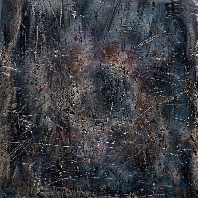 Seamless tileable texture of blackened steel heavily worn and patinated