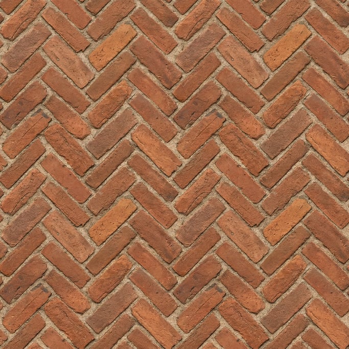 Seamless tileable texture of brick herringbone lightly weathered and aged