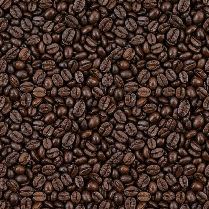Seamless tileable texture of whole coffee beans wet with water