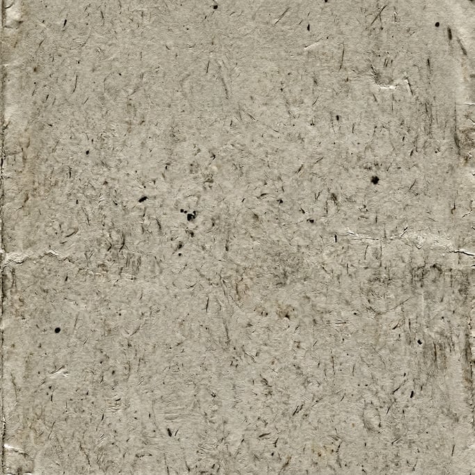 Seamless tileable texture of newsprint heavily worn and patinated