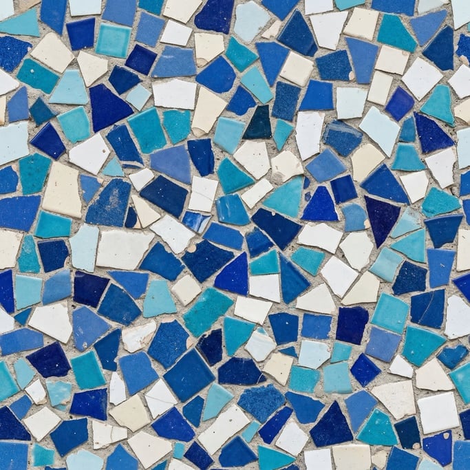 Seamless tileable texture of broken tile mosaic freshly cut and raw