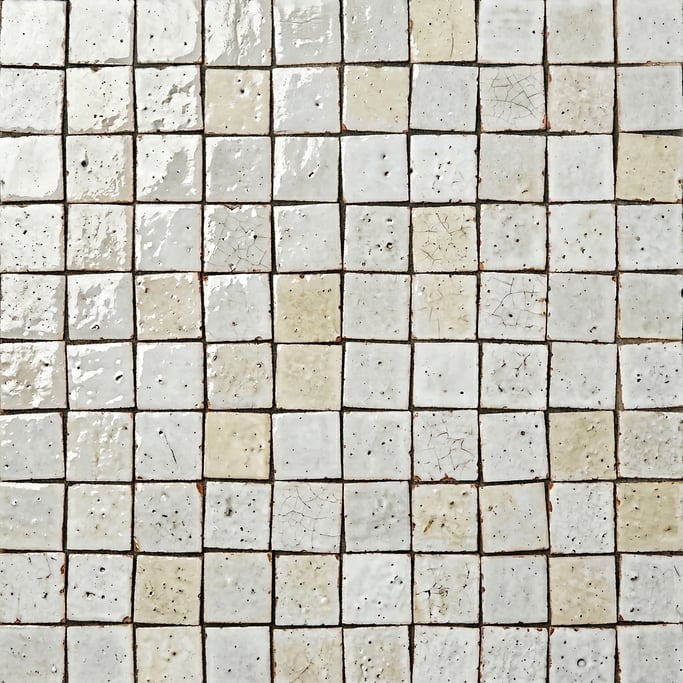 Seamless tileable texture of Zellige tile in white in extreme close-up showing micro-detail