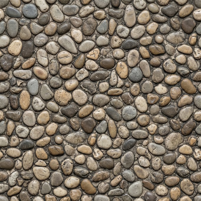 Seamless tileable texture of river pebble mosaic heavily worn and patinated