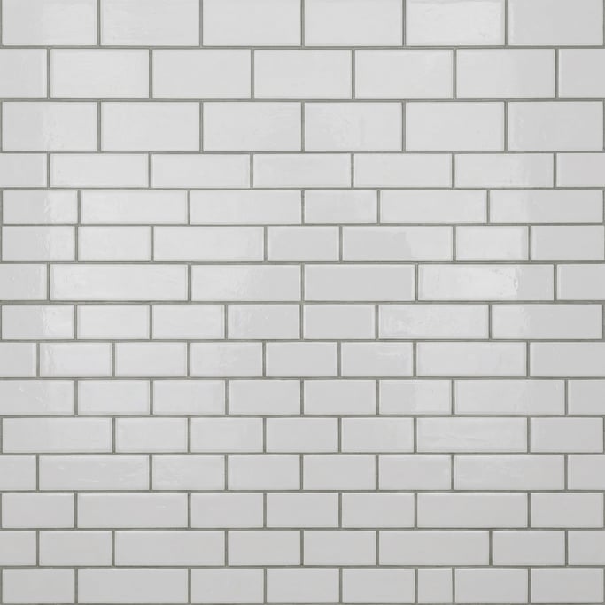 Seamless tileable texture of white subway tile wet with water