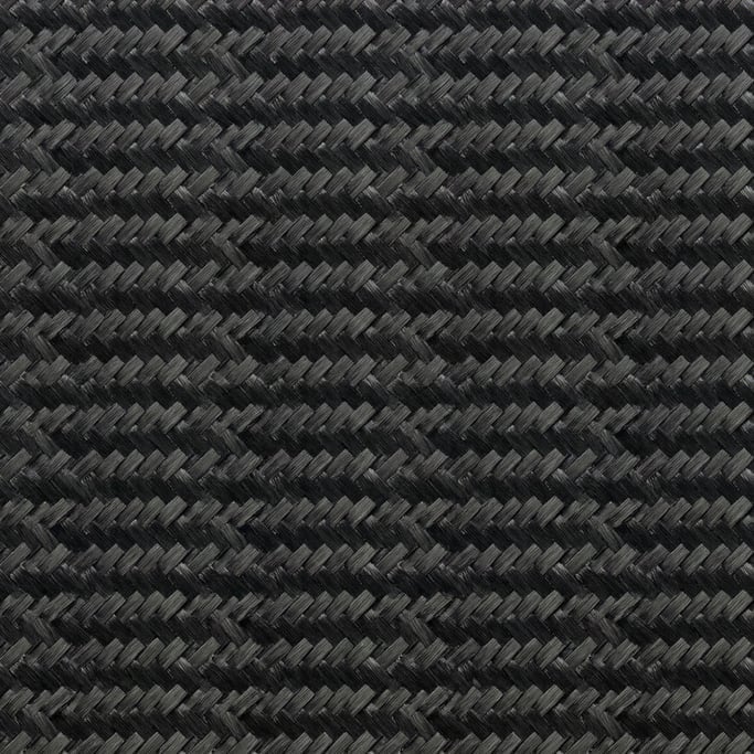 Seamless tileable texture of carbon fiber weave freshly cut and raw