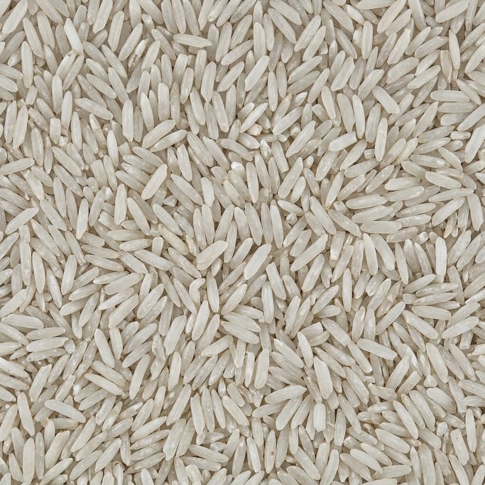 Seamless tileable texture of rice grains heavily worn and patinated