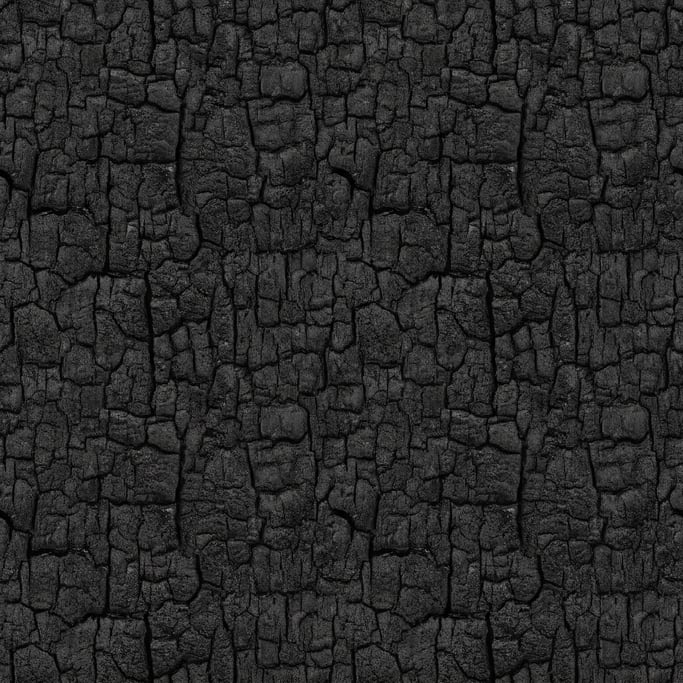 Seamless tileable texture of charred wood shou sugi ban at higher magnification