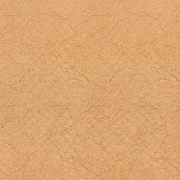 Seamless tileable texture of full-grain leather tan at higher magnification