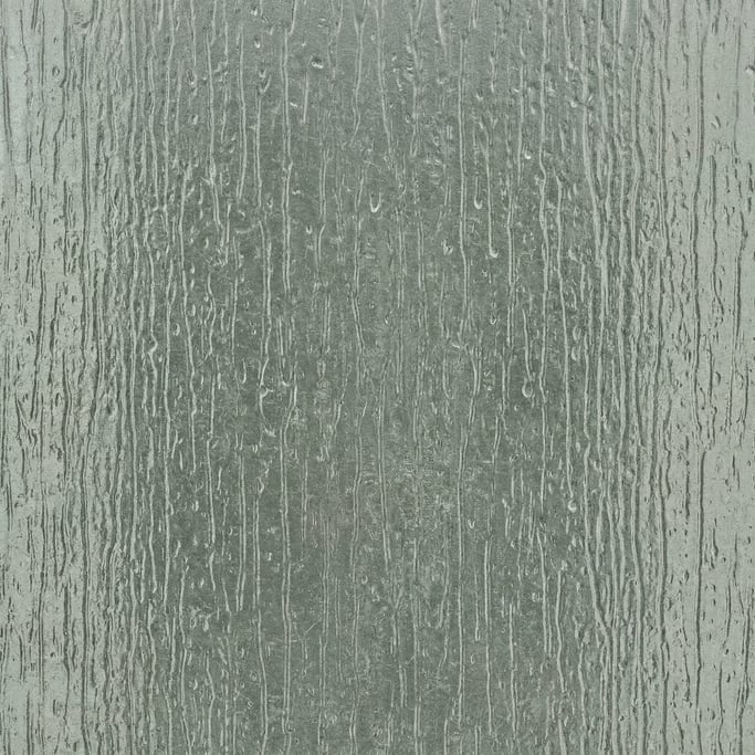 Seamless tileable texture of textured glass rain pattern lightly weathered and aged