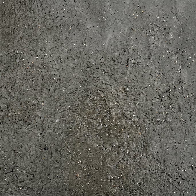 Seamless tileable texture of raw concrete wet with water