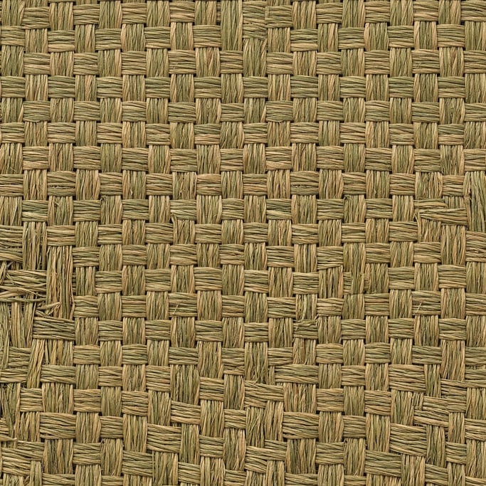 Seamless tileable texture of woven seagrass freshly cut and raw