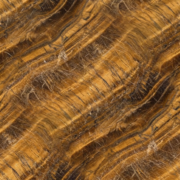 Seamless tileable texture of tiger eye stone heavily worn and patinated