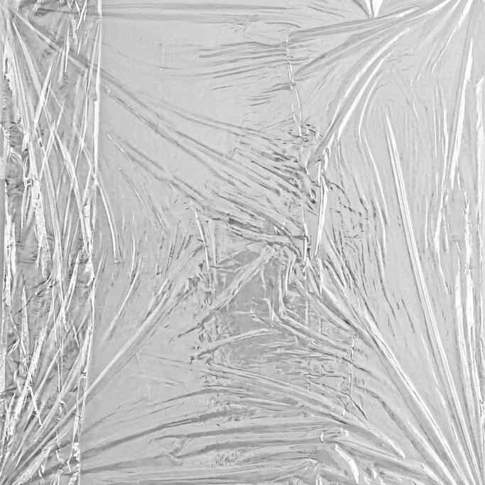 Seamless tileable texture of plastic wrap freshly cut and raw