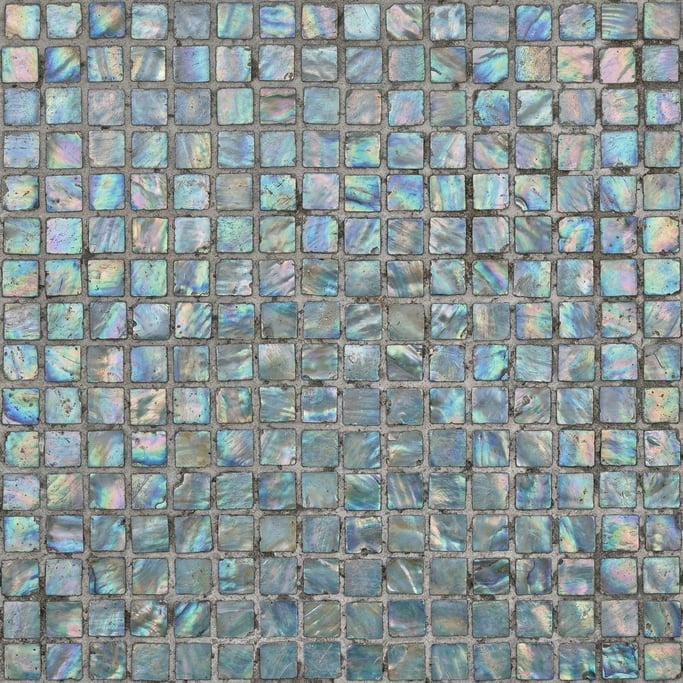 Seamless tileable texture of mosaic tile in iridescent lightly weathered and aged
