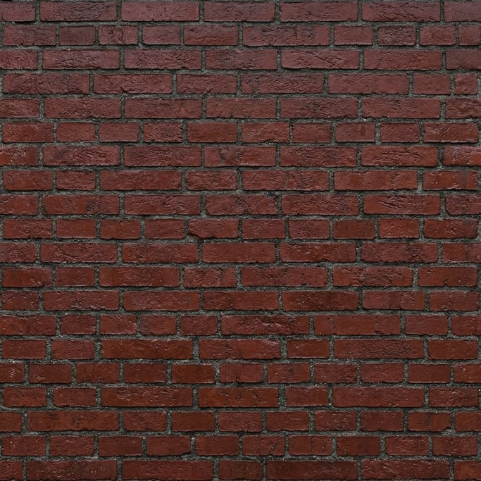 Seamless tileable texture of red brick wall wet with water