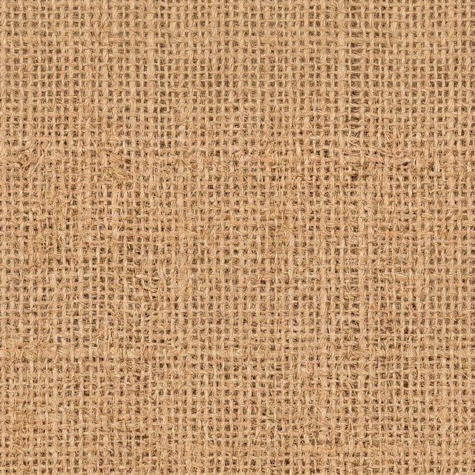 Seamless tileable texture of burlap freshly cut and raw