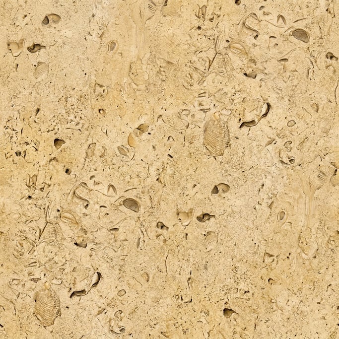 Seamless tileable texture of Jerusalem stone heavily worn and patinated