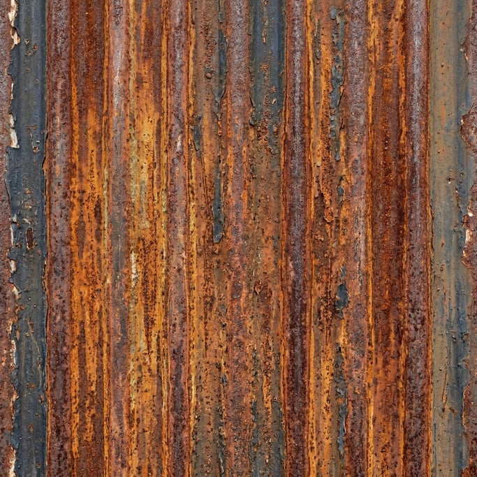 Seamless tileable texture of rusted corrugated metal in extreme close-up showing micro-detail