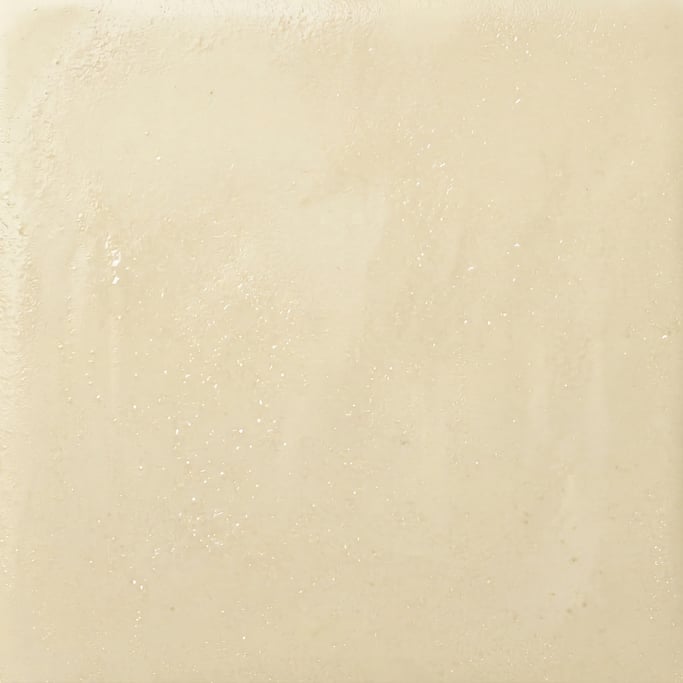 Seamless tileable texture of white chocolate wet with water