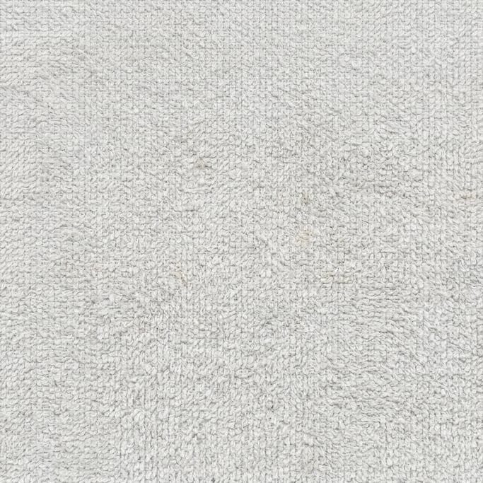Seamless tileable texture of terry cloth lightly weathered and aged
