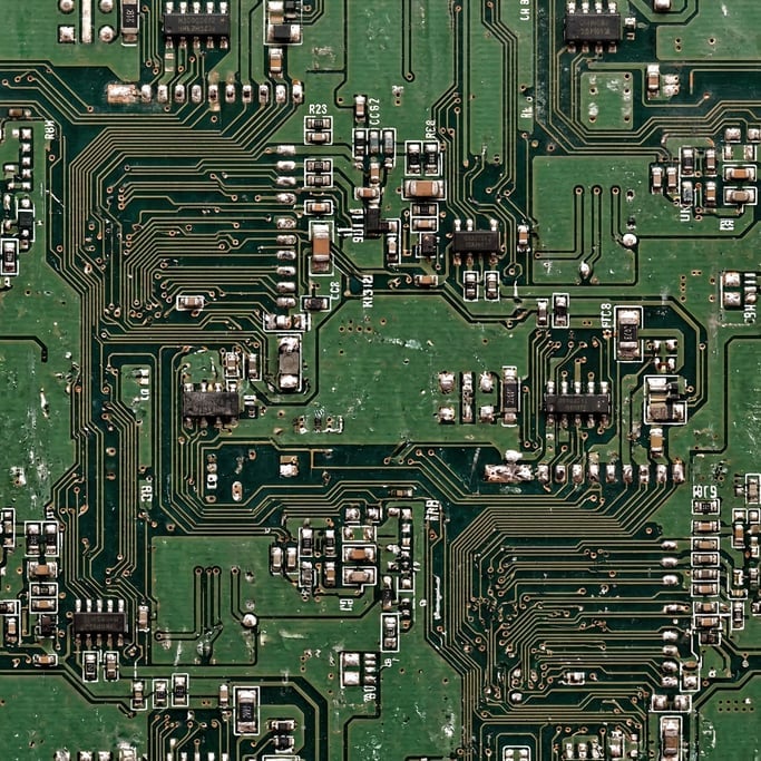 Seamless tileable texture of circuit board lightly weathered and aged